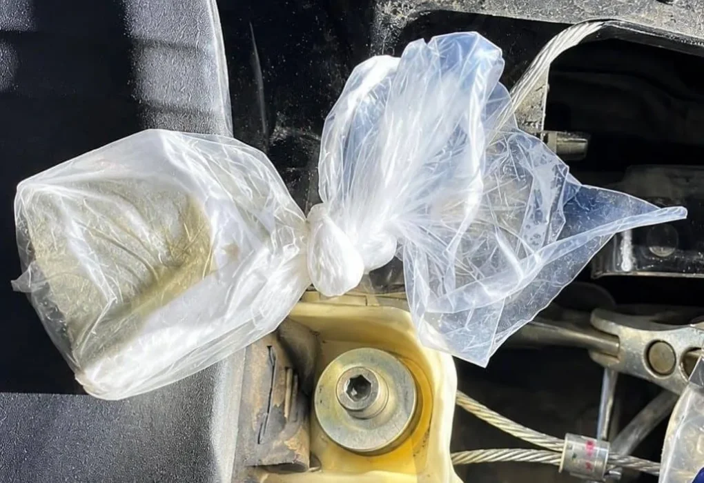 Deschutes County Sheriff’s Office patrol vehicle and motorcycle during a drug arrest