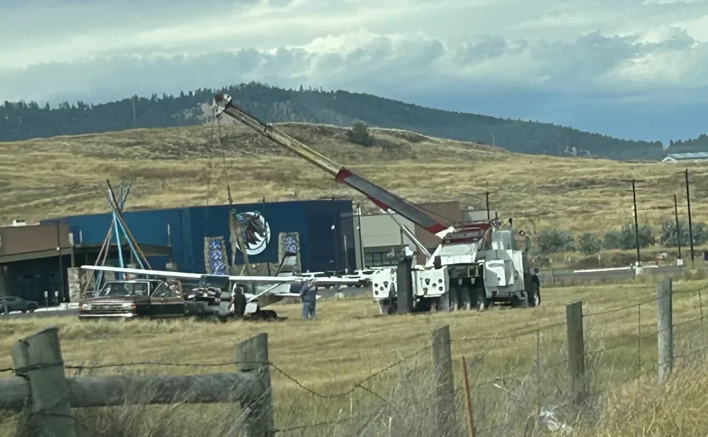 Small airplane on an airport field after crash-landing with visible damage in Polson, Montana