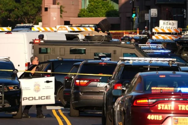 Police respond outside Shoreline Plaza apartment building in downtown Minneapolis after a deadly shooting
